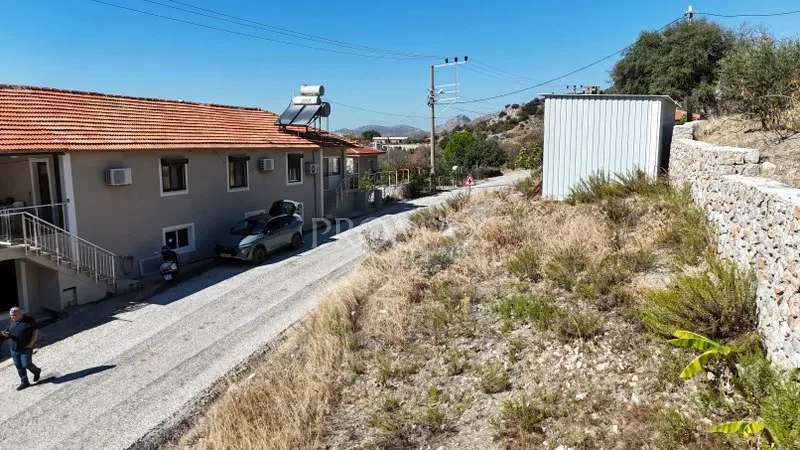 MARMARİS SÖĞÜT KÖYÜ'NDE 150 m2 DENİZ MANZARALI ARAZİ